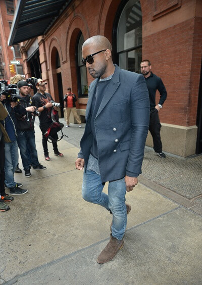 Kanye West leaving his apartment in the city