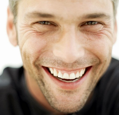 Young Man Laughing --- Image by © Royalty-Free/Corbis
